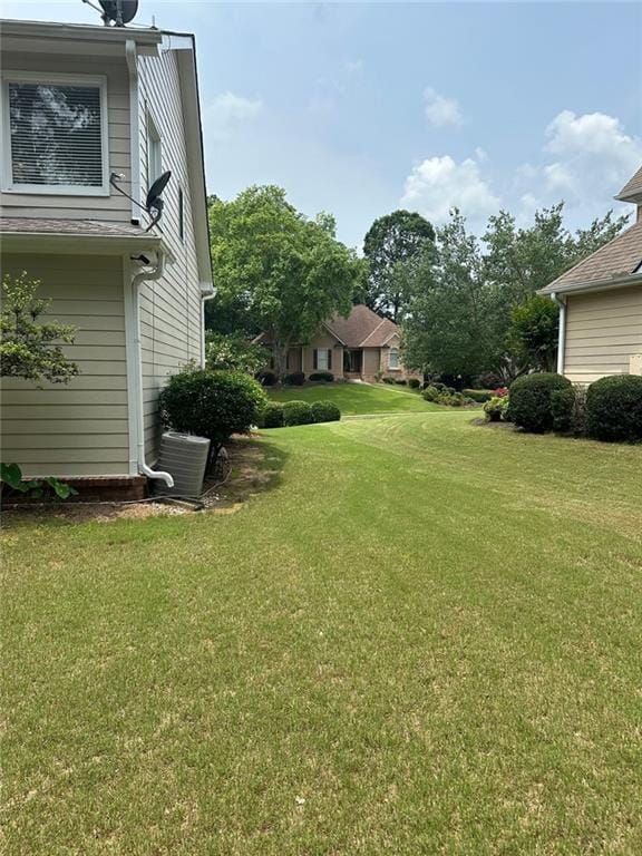 3381 Walkers Ridge Rd, Dacula, GA 30019 - view of grassy yard featuring cooling unit