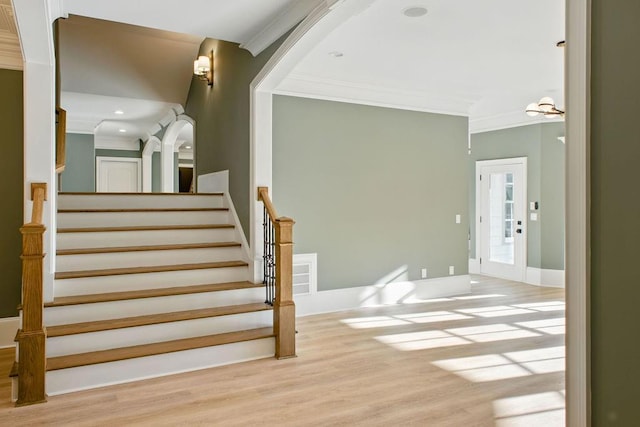 6756 Hedge Row Ln, Gainesville, GA 30506 - stairs featuring ornamental molding, wood finished floors, and recessed lighting