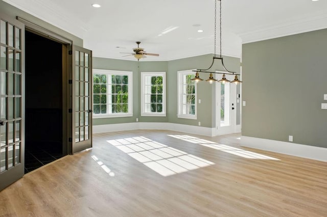 6756 Hedge Row Ln, Gainesville, GA 30506 - unfurnished dining area with ornamental molding, baseboards, wood finished floors, ceiling fan, and recessed lighting
