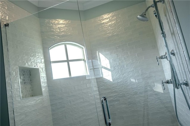 full bath with a shower stall
