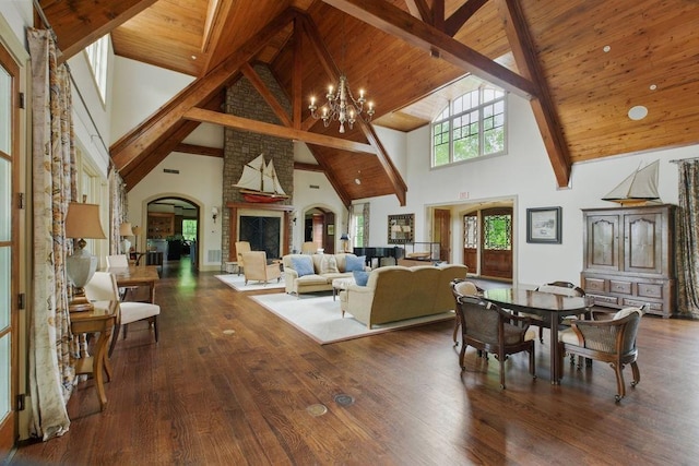 6756 Hedge Row Ln, Gainesville, GA 30506 - dining space with high vaulted ceiling, arched walkways, wood finished floors, a chandelier, and wood ceiling with exposed beams