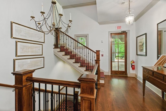 6756 Hedge Row Ln, Gainesville, GA 30506 - foyer with a chandelier, wood finished floors, crown molding, baseboards, and stairs
