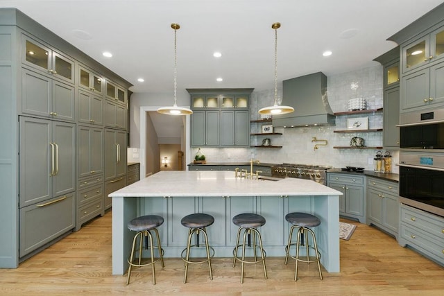 6756 Hedge Row Ln, Gainesville, GA 30506 - kitchen with wall chimney exhaust hood, open shelves, tasteful backsplash, a sink, and recessed lighting