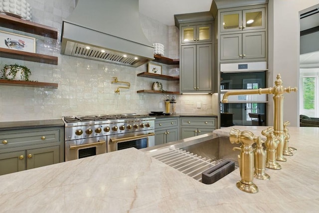 6756 Hedge Row Ln, Gainesville, GA 30506 - kitchen with premium range hood, double oven range, open shelves, and tasteful backsplash