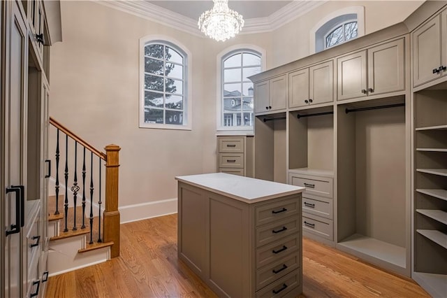 interior space featuring light wood-style floors and a chandelier