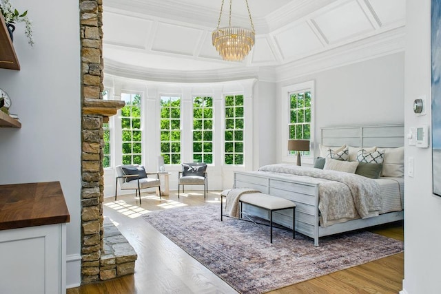 6756 Hedge Row Ln, Gainesville, GA 30506 - bedroom with ornamental molding, wood finished floors, a chandelier, and coffered ceiling
