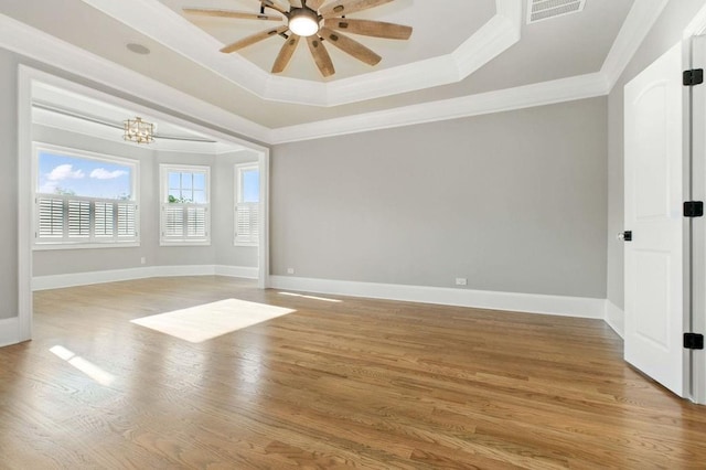 6756 Hedge Row Ln, Gainesville, GA 30506 - unfurnished room with ornamental molding, a raised ceiling, a ceiling fan, light wood-type flooring, and baseboards