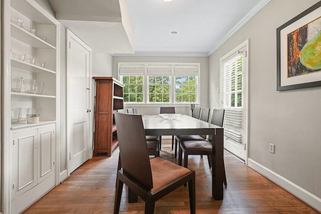 3734 Powers Ferry Rd NW, Atlanta, GA 30342 - dining area featuring ornamental molding, wood finished floors, and baseboards