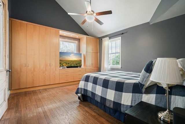 3734 Powers Ferry Rd NW, Atlanta, GA 30342 - bedroom featuring vaulted ceiling, light wood-style floors, and a ceiling fan