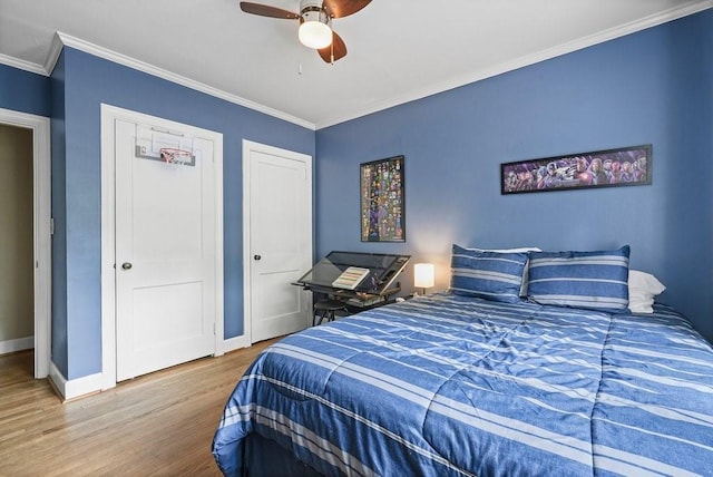 3734 Powers Ferry Rd NW, Atlanta, GA 30342 - bedroom featuring wood finished floors, baseboards, crown molding, and a ceiling fan