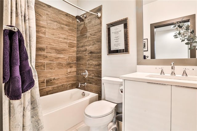 full bath with vanity, toilet, and shower / bath combo with shower curtain