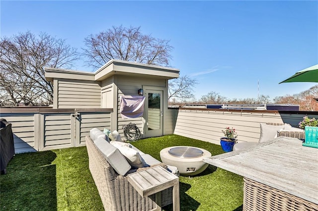 exterior space featuring a yard and fence