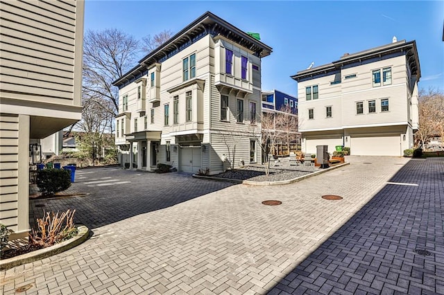 exterior space featuring driveway and an attached garage