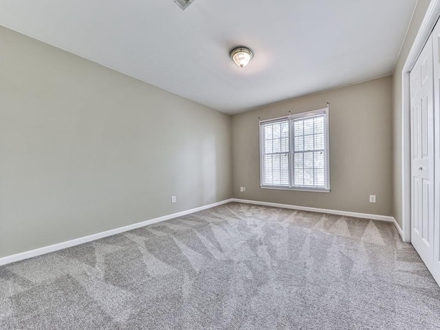 4601 Ethel Springs Trl SW, Mableton, GA 30126 - spare room featuring baseboards and carpet floors