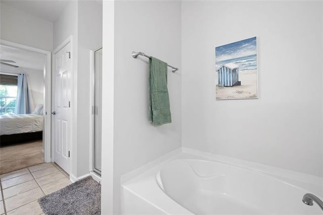 1975 Nocturne Dr Unit 2303, Alpharetta, GA 30009 - ensuite bathroom with tile patterned floors, a garden tub, and a stall shower