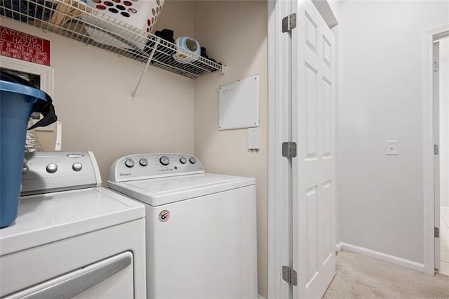 1975 Nocturne Dr Unit 2303, Alpharetta, GA 30009 - clothes washing area featuring washer and clothes dryer, light carpet, and baseboards
