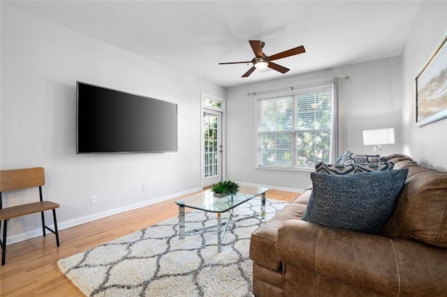 1975 Nocturne Dr Unit 2303, Alpharetta, GA 30009 - living room featuring wood finished floors, a ceiling fan, and baseboards