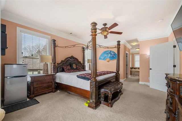 carpeted bedroom with freestanding refrigerator, visible vents, crown molding, and baseboards