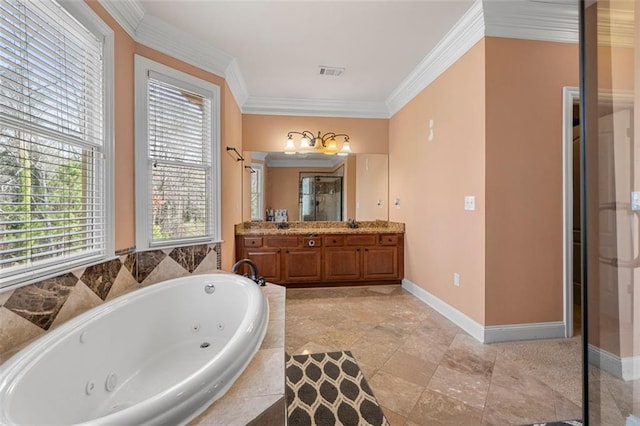 bathroom featuring crown molding, visible vents, vanity, baseboards, and a tub with jets