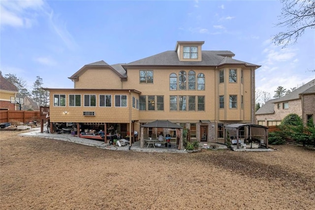 back of house with a patio and a gazebo