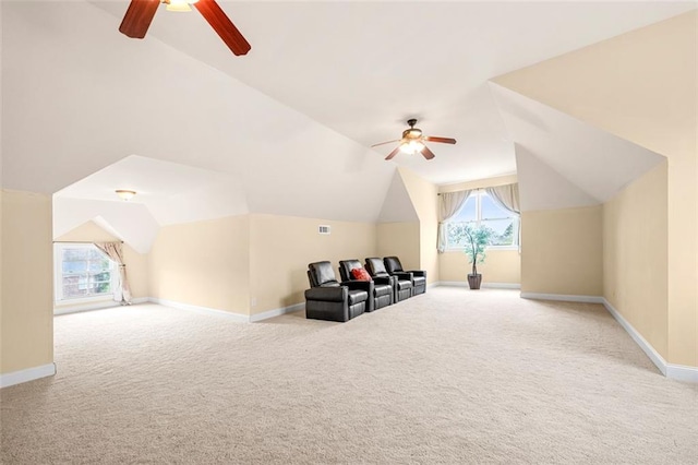 additional living space featuring carpet, visible vents, baseboards, and vaulted ceiling