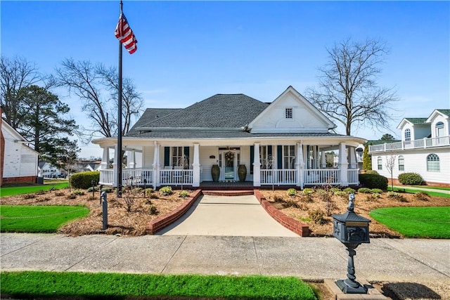 farmhouse-style home with covered porch