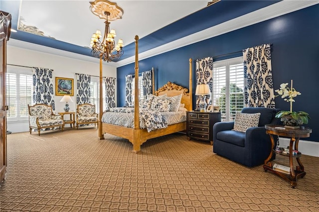 carpeted bedroom with a chandelier, multiple windows, crown molding, and a raised ceiling