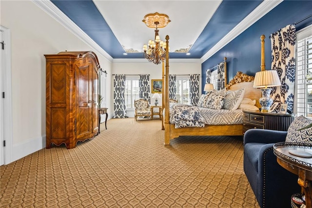 carpeted bedroom featuring baseboards, a raised ceiling, a notable chandelier, and ornamental molding