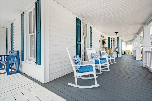 deck with radiator and a porch