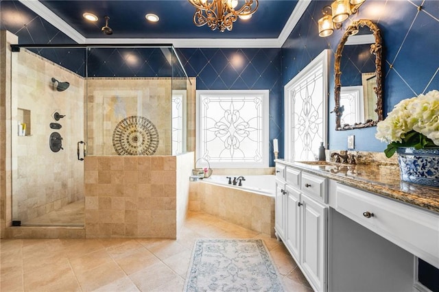 full bath with a shower stall, ornamental molding, an inviting chandelier, a bath, and vanity