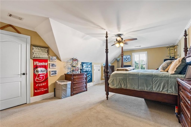 bedroom with carpet, visible vents, ceiling fan, vaulted ceiling, and crown molding