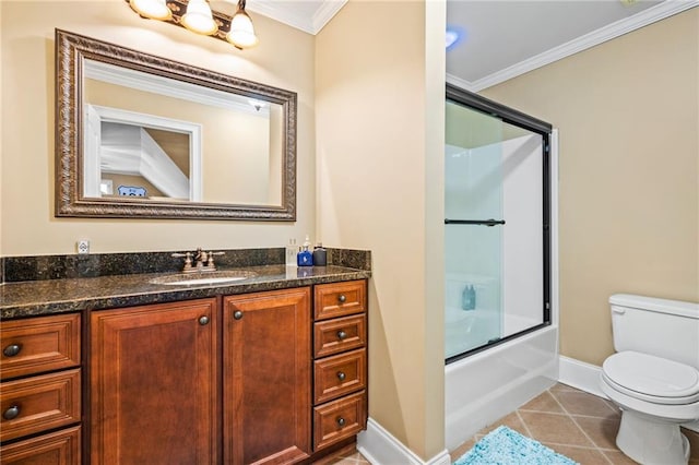 full bath with tile patterned floors, toilet, vanity, and ornamental molding