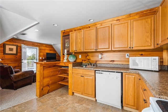 kitchen with visible vents, open floor plan, recessed lighting, white appliances, and a sink