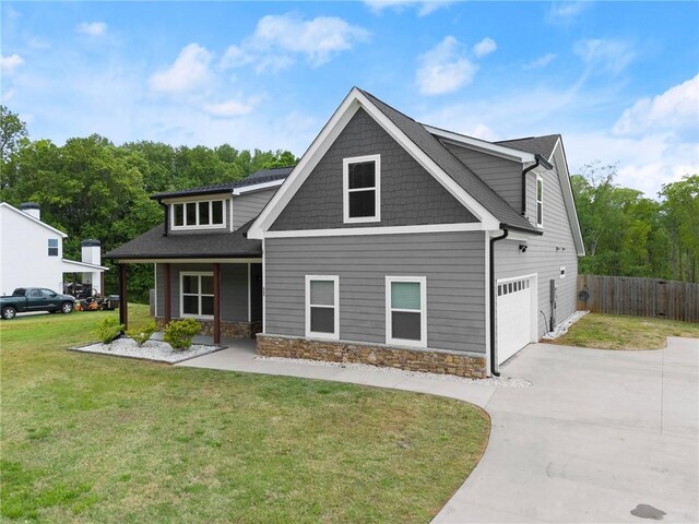 526 Wilbanks Rd, Alto, GA 30510 - craftsman house with fence, an attached garage, a front lawn, and concrete driveway