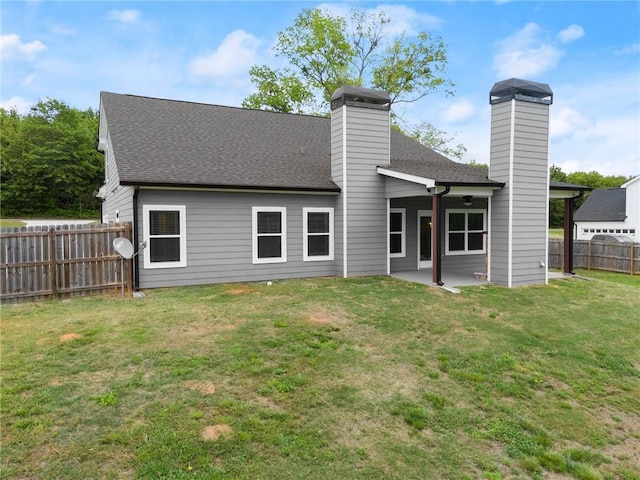 526 Wilbanks Rd, Alto, GA 30510 - rear view of property with a chimney, a fenced backyard, a yard, a patio area, and roof with shingles