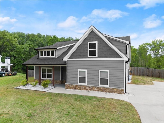 526 Wilbanks Rd, Alto, GA 30510 - craftsman house with concrete driveway, stone siding, fence, a porch, and a front yard