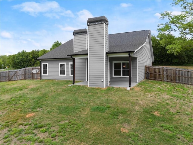 526 Wilbanks Rd, Alto, GA 30510 - back of house featuring a chimney, a fenced backyard, a shingled roof, a patio area, and a lawn
