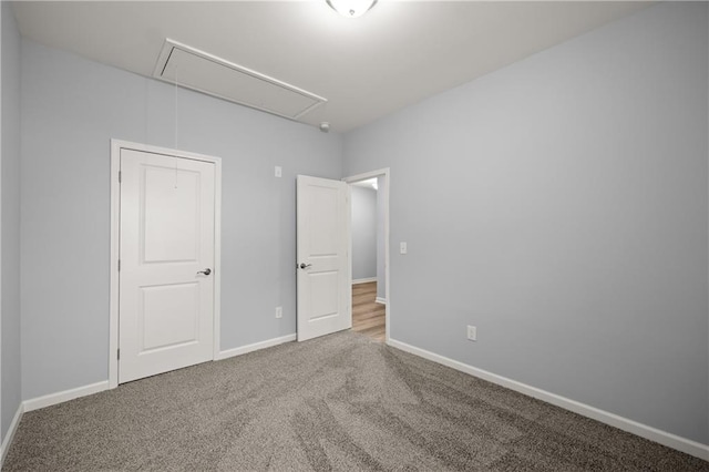 526 Wilbanks Rd, Alto, GA 30510 - unfurnished bedroom with attic access, carpet floors, and baseboards