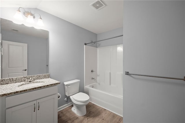 526 Wilbanks Rd, Alto, GA 30510 - full bathroom with wood finished floors, visible vents, toilet, vanity, and  shower combination