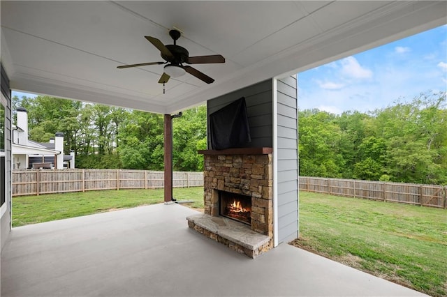 526 Wilbanks Rd, Alto, GA 30510 - view of patio / terrace with a fenced backyard, an outdoor stone fireplace, and ceiling fan