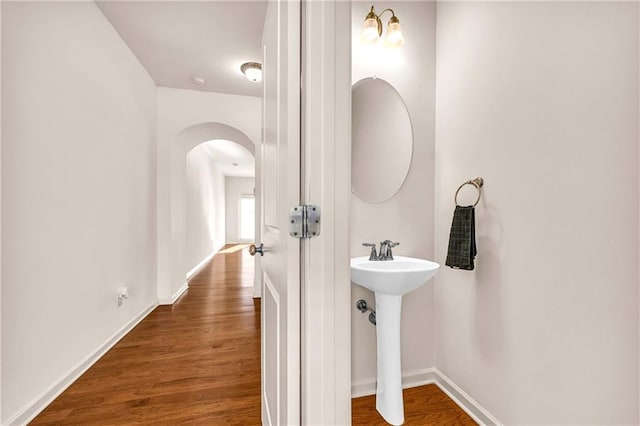 bathroom featuring hardwood / wood-style flooring and sink