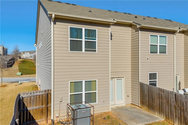 rear view of property featuring a patio area