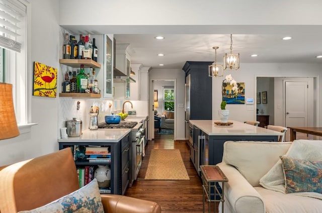 522 Trabert Ave NW, Atlanta, GA 30309 - kitchen with open shelves, light countertops, dark wood-style floors, recessed lighting, and double oven range