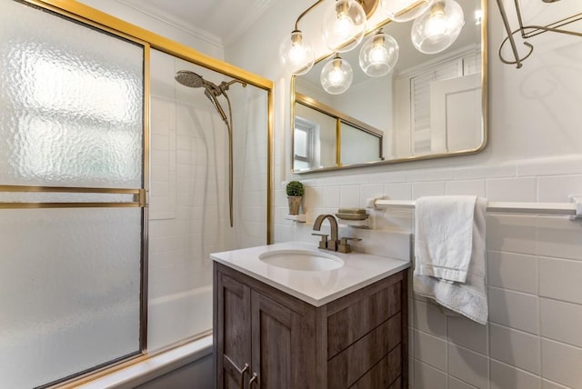 522 Trabert Ave NW, Atlanta, GA 30309 - full bathroom with tile walls, enclosed tub / shower combo, vanity, and crown molding