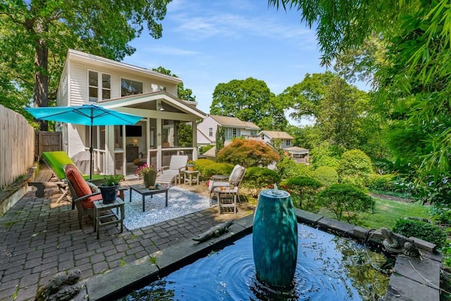 522 Trabert Ave NW, Atlanta, GA 30309 - rear view of house featuring a patio