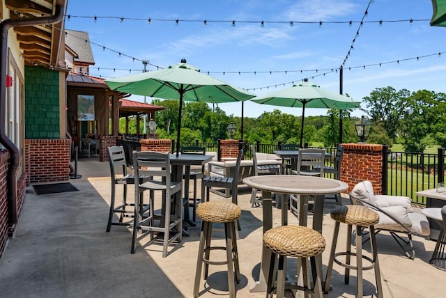 522 Trabert Ave NW, Atlanta, GA 30309 - view of patio / terrace featuring outdoor dining area and a gazebo