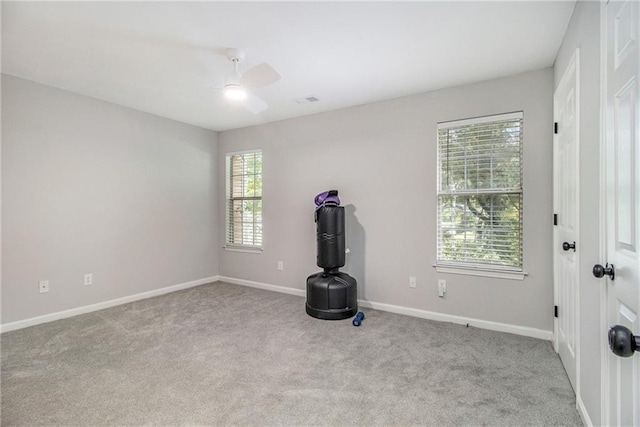 2376 Wellington Cir, Lithonia, GA 30058 - carpeted empty room with ceiling fan and baseboards