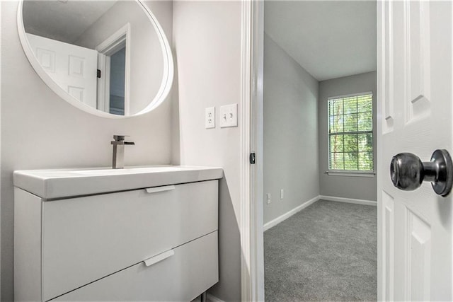 2376 Wellington Cir, Lithonia, GA 30058 - bathroom with vanity and baseboards