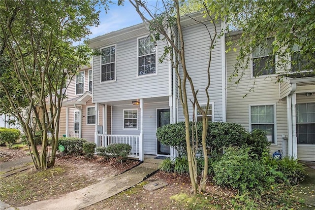 2376 Wellington Cir, Lithonia, GA 30058 - view of property with covered porch