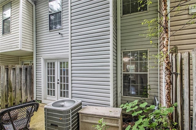 2376 Wellington Cir, Lithonia, GA 30058 - exterior view of a central AC unit and french doors